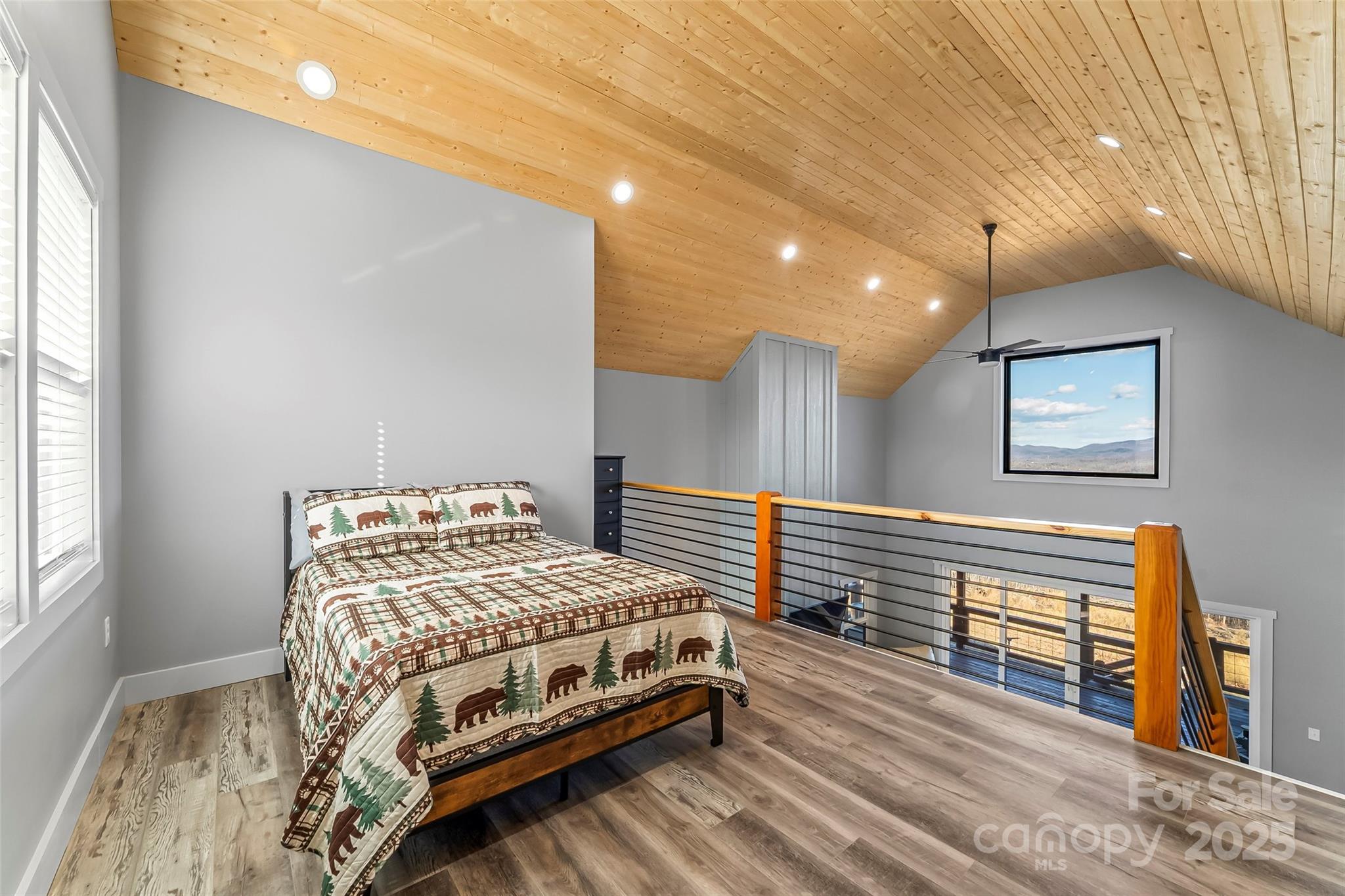 53 Cres Ridge Lane Nebo, NC 28761 - Photo 20 of 48 a bedroom with a bed and a view of bathroom