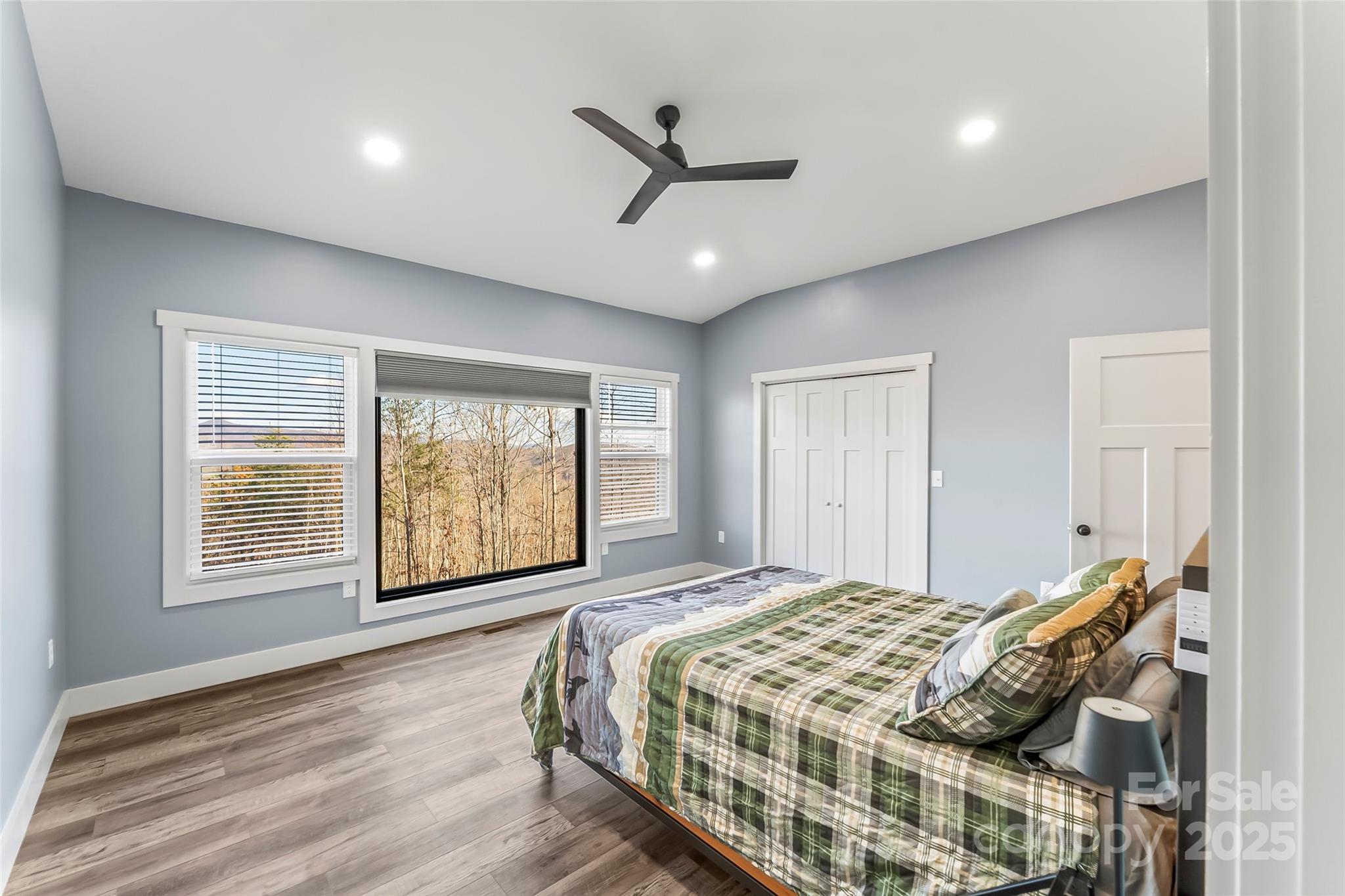 53 Cres Ridge Lane Nebo, NC 28761 - Photo 23 of 48 a bedroom with a large bed and a window