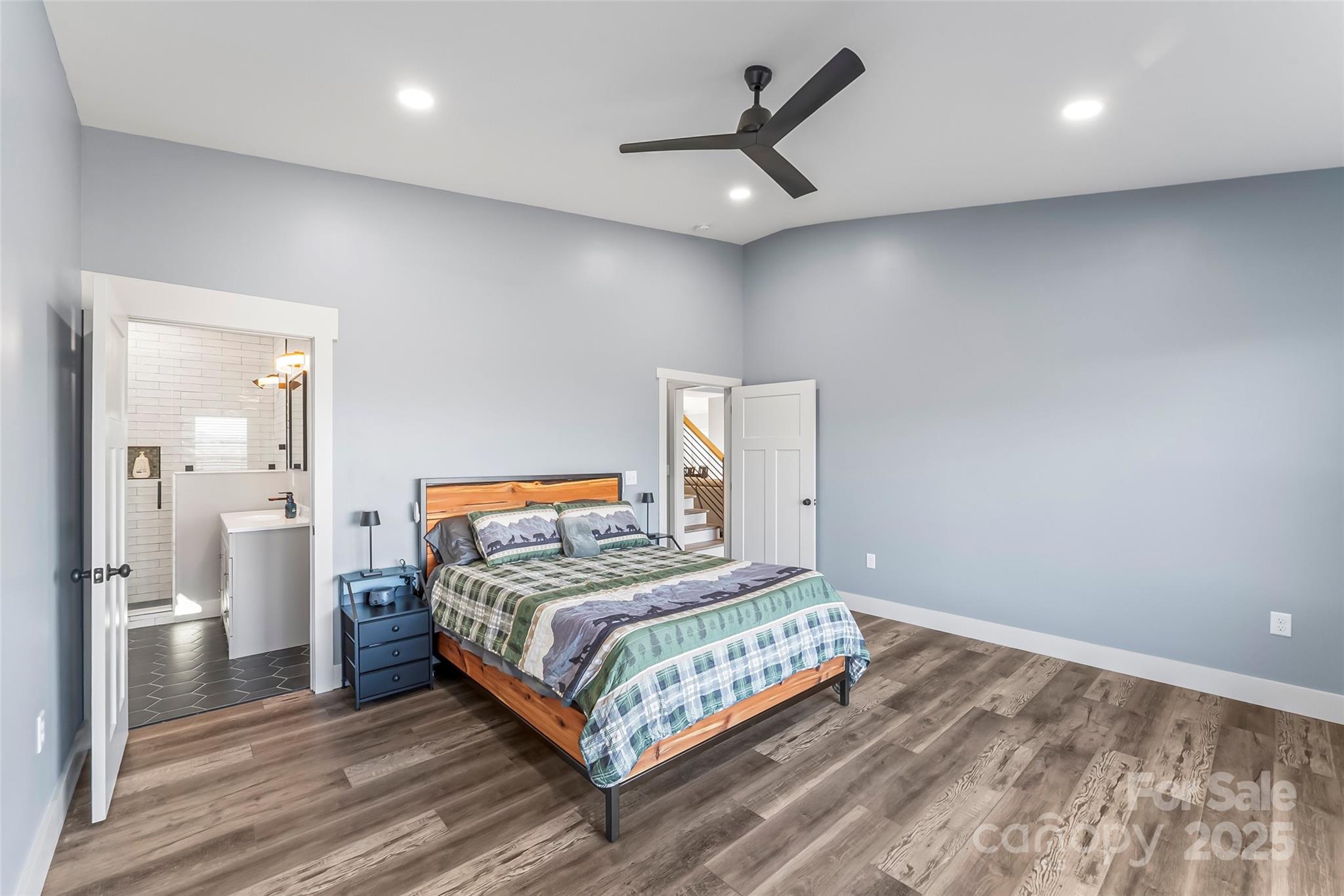 53 Cres Ridge Lane Nebo, NC 28761 - Photo 25 of 48 a bedroom with a bed and a view of bathroom