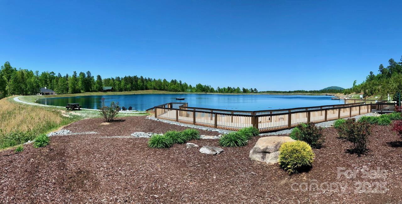 53 Cres Ridge Lane Nebo, NC 28761 - Photo 48 of 48 a view of a lake with a garden