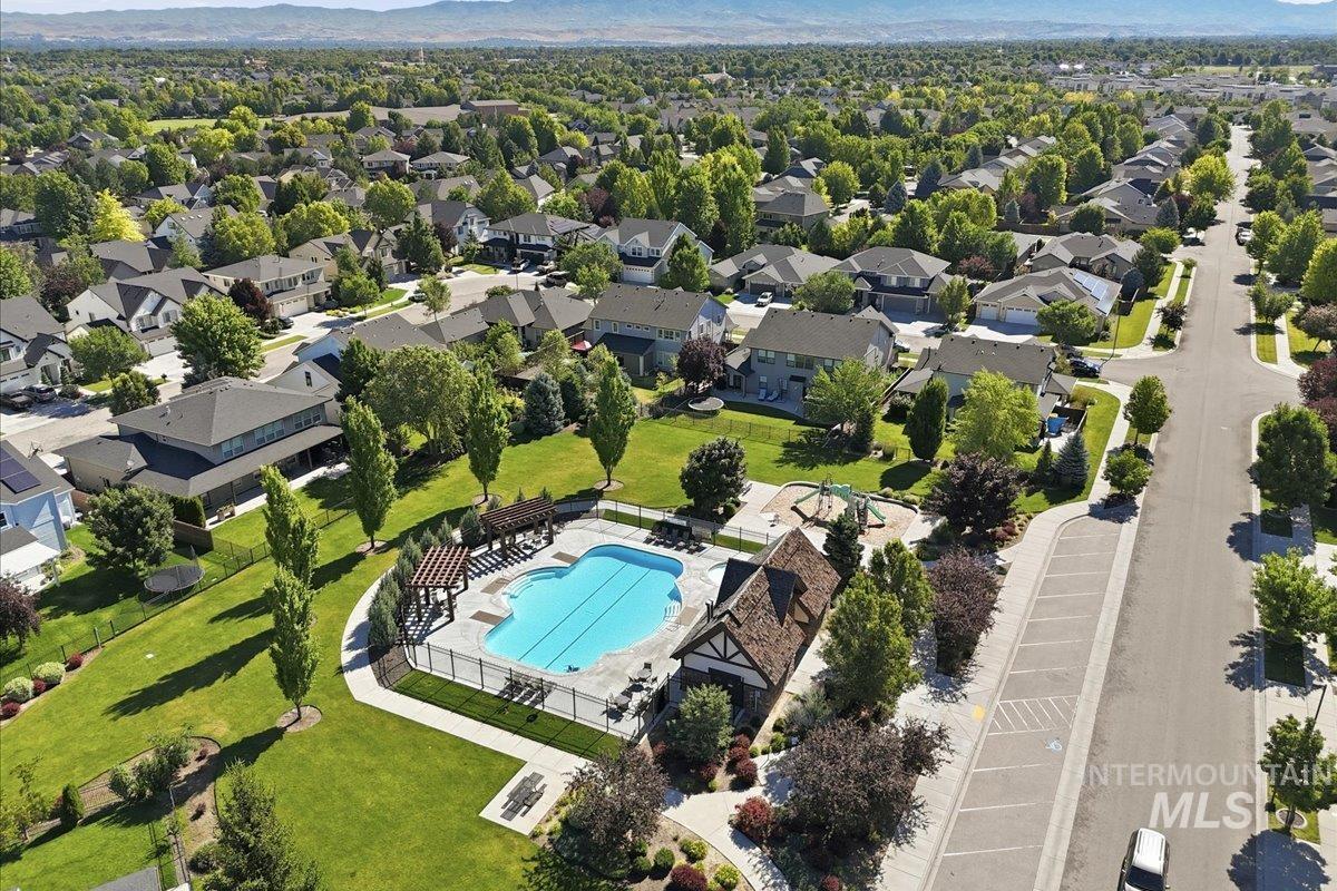 1303 West Brando Street Meridian, ID 83646 - Photo 42 of 49 Aerial perspective showcasing a residential community with abundant green spaces