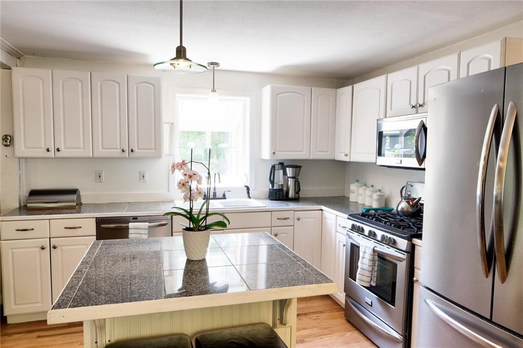 244 Mallego Road Barrington, NH 03825 - Photo 6 of 35 The island is the perfect spot for a...