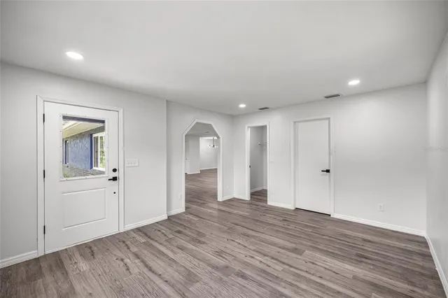 a view of a livingroom with wooden floor