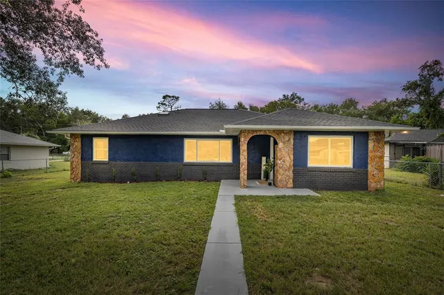 a house view with a garden space
