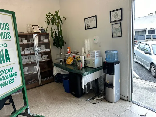 a view of a workspace with furniture