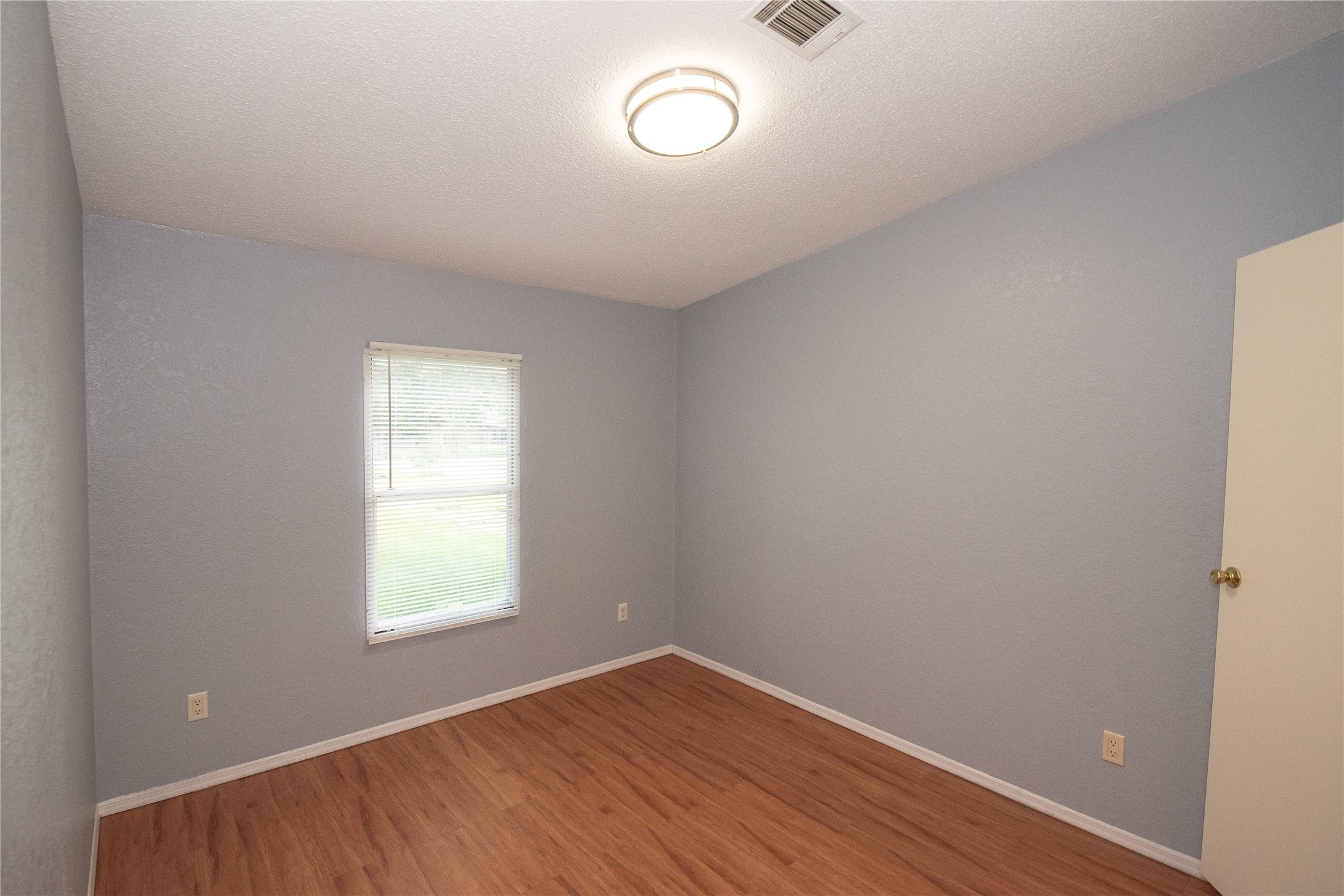 11804 Trickey Road Houston, TX 77067 - Photo 9 of 9 an empty room with a window