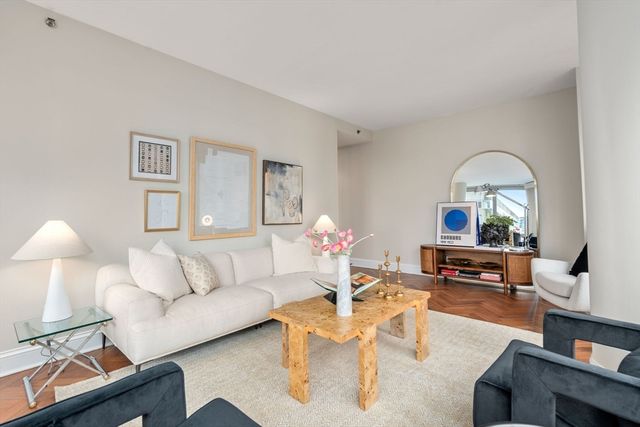 a living room with furniture and a couch