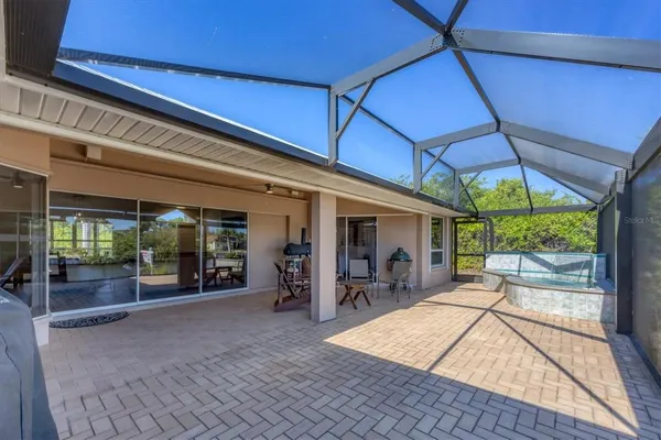 a view of swimming pool with a back yard
