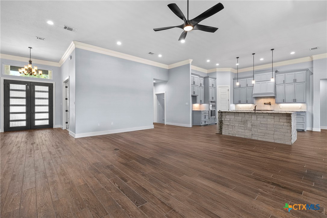 1606 Alta Vista Loop Temple, TX 76502 - Photo 12 of 48 a view of a kitchen with a refrigerator and a window