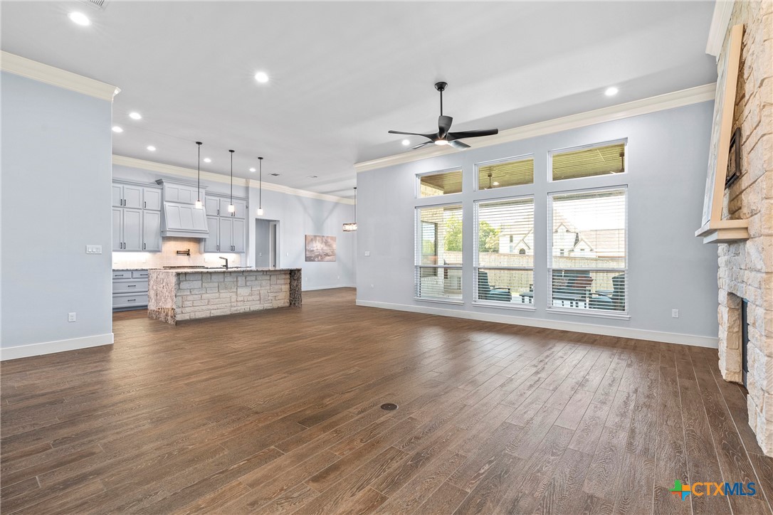 1606 Alta Vista Loop Temple, TX 76502 - Photo 13 of 48 a view of an empty room with wooden floor and a window
