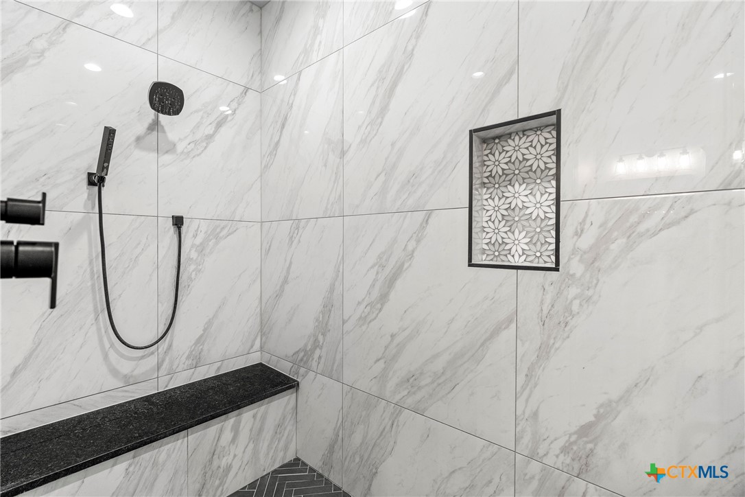 1606 Alta Vista Loop Temple, TX 76502 - Photo 26 of 48 a bathroom with a shower