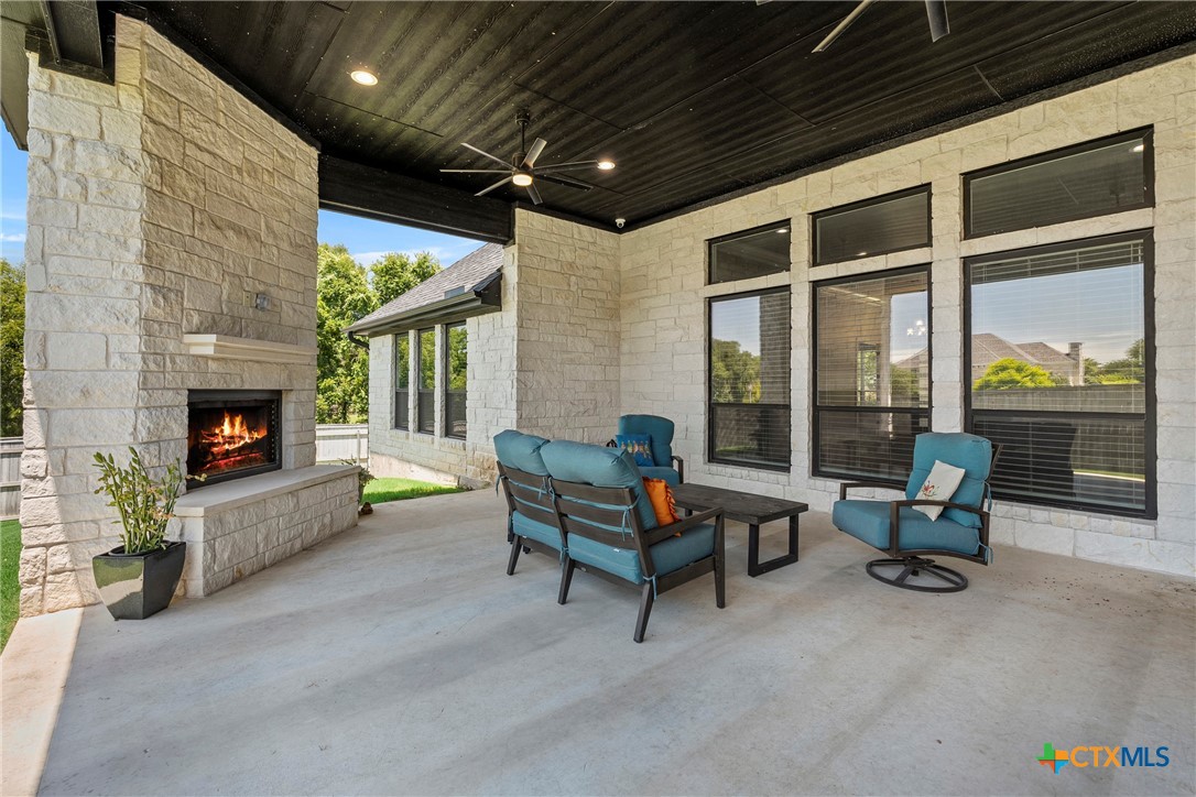 1606 Alta Vista Loop Temple, TX 76502 - Photo 35 of 48 a living room with furniture and a fireplace