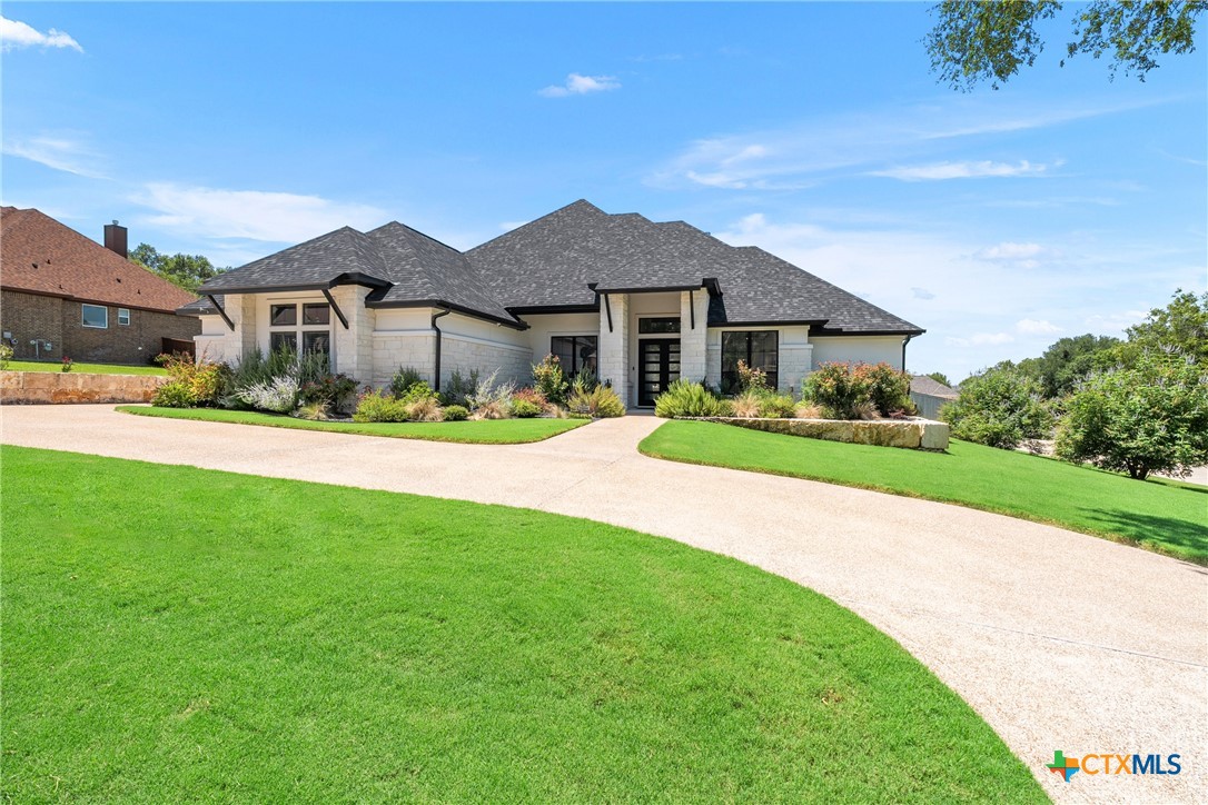 1606 Alta Vista Loop Temple, TX 76502 - Photo 8 of 48 a front view of house with yard and green space