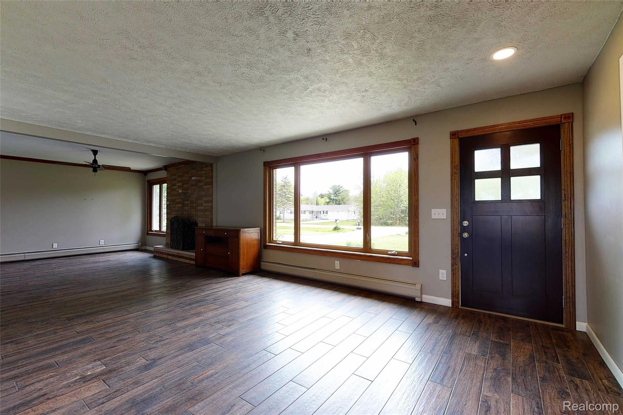 1296 West Parks Road St. Johns, MI 48879 - Photo 10 of 30 1238-W-Parks-Rd-2 Living Room.jpg
