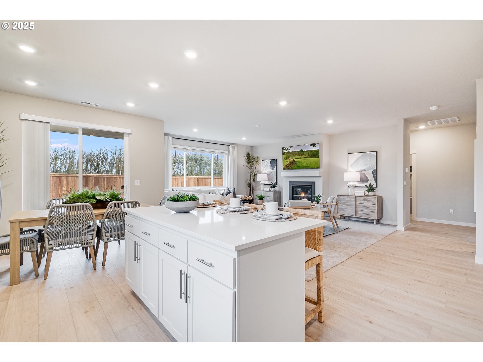 Undisclosed Address Albany, OR 97322 - Photo 11 of 42 a kitchen with stainless steel appliances kitchen island granite countertop a sink and cabinets
