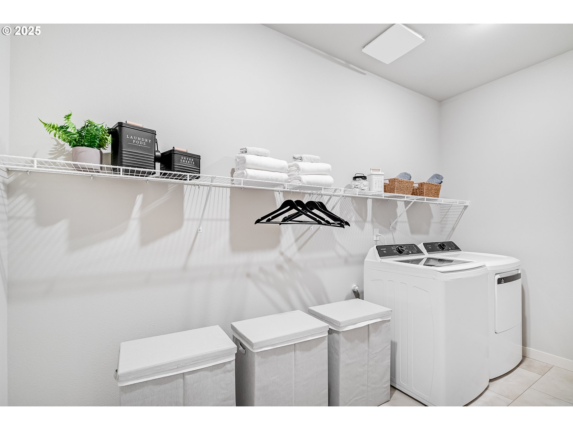 Undisclosed Address Albany, OR 97322 - Photo 12 of 42 a utility room with dryer washer and sink