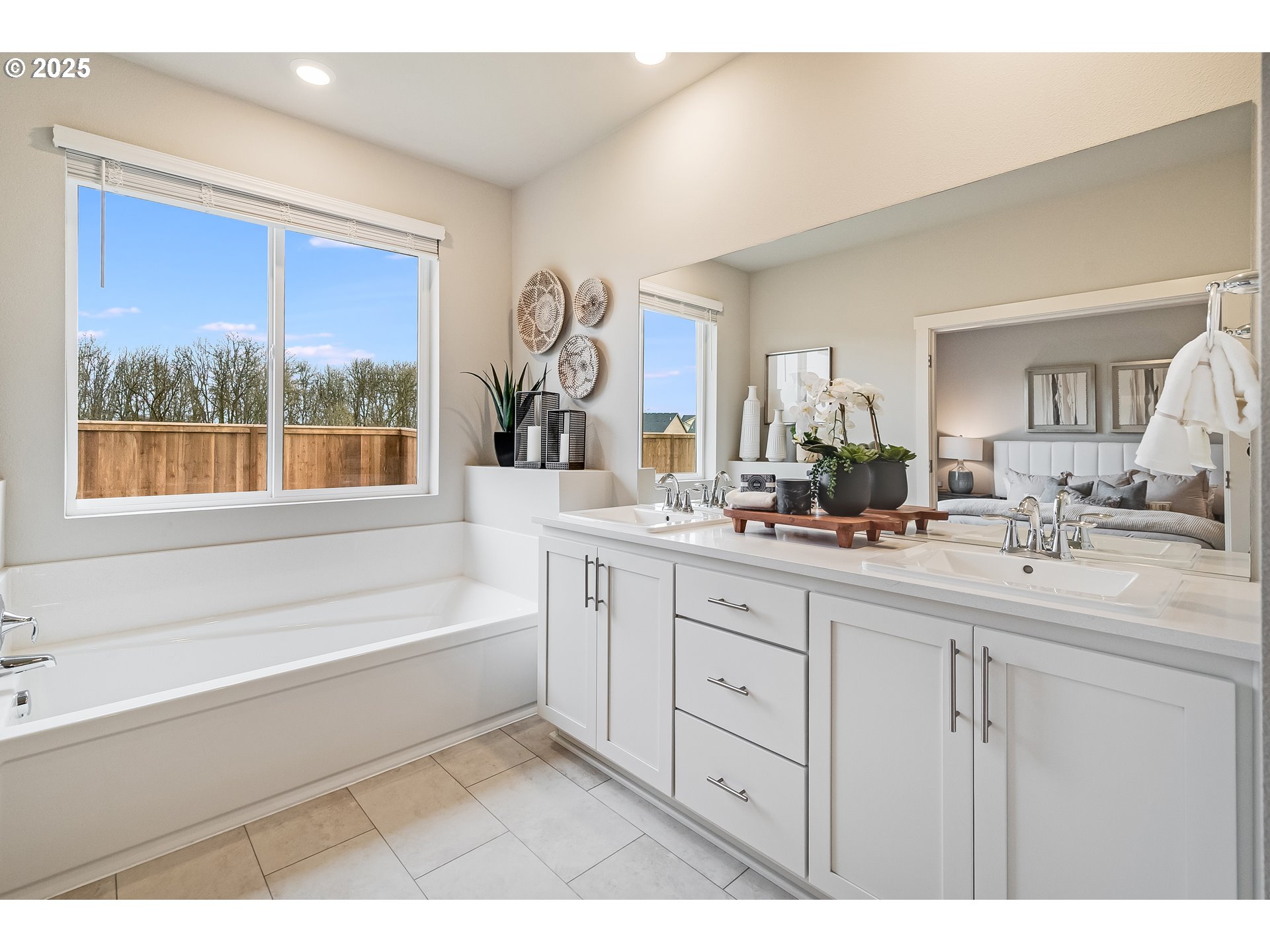 Undisclosed Address Albany, OR 97322 - Photo 17 of 42 a bathroom with a tub sink and mirror