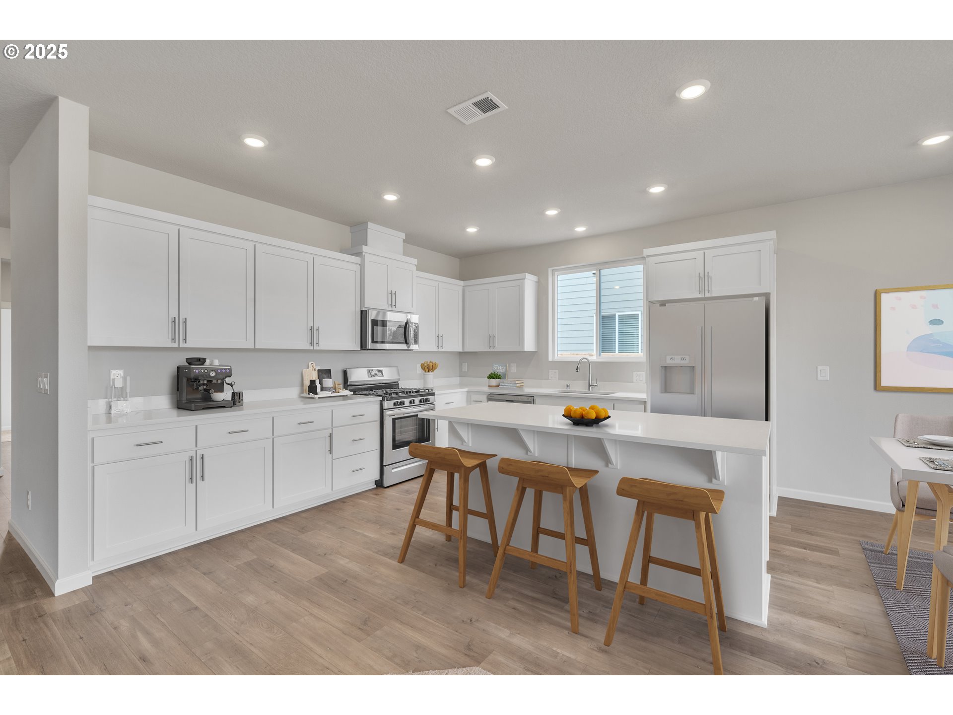 Undisclosed Address Albany, OR 97322 - Photo 25 of 42 a kitchen with a dining table chairs and white appliances