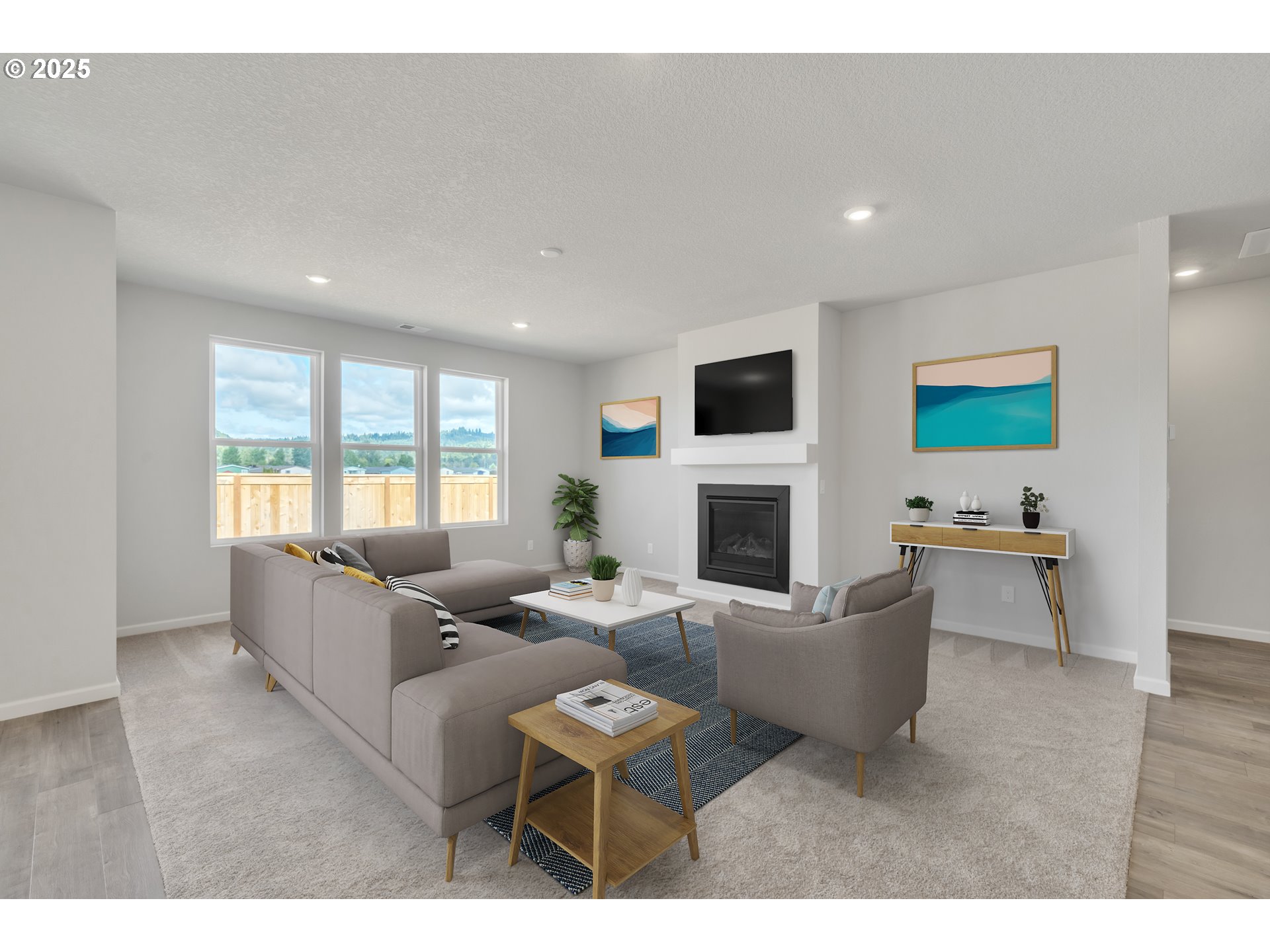 Undisclosed Address Albany, OR 97322 - Photo 26 of 42 a living room with furniture a fireplace and a flat screen tv