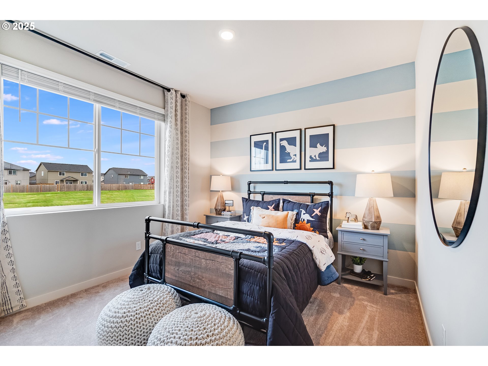 Undisclosed Address Albany, OR 97322 - Photo 3 of 42 a bedroom with a bed a mirror and furniture