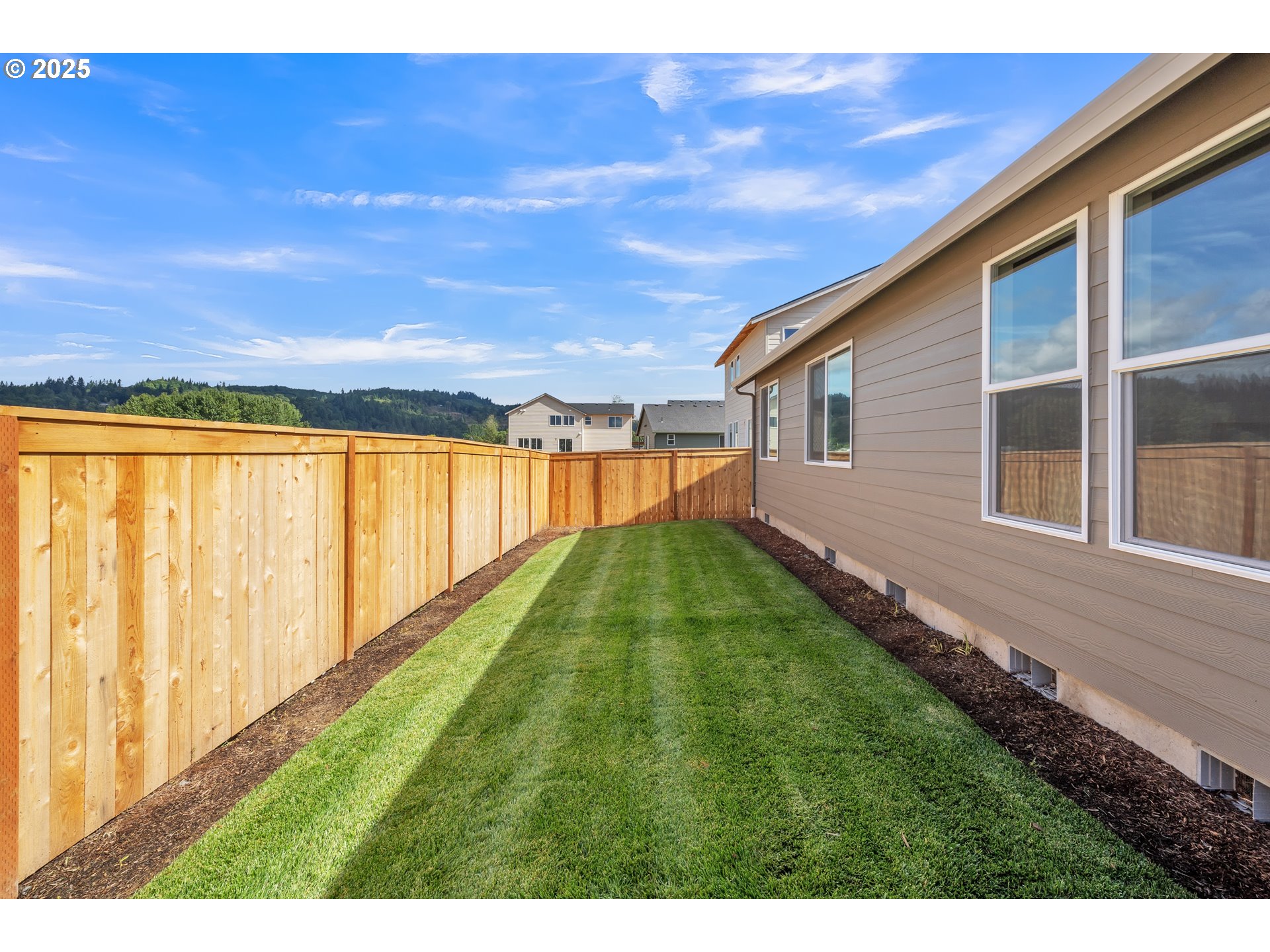Undisclosed Address Albany, OR 97322 - Photo 41 of 42 a view of a backyard with a garden