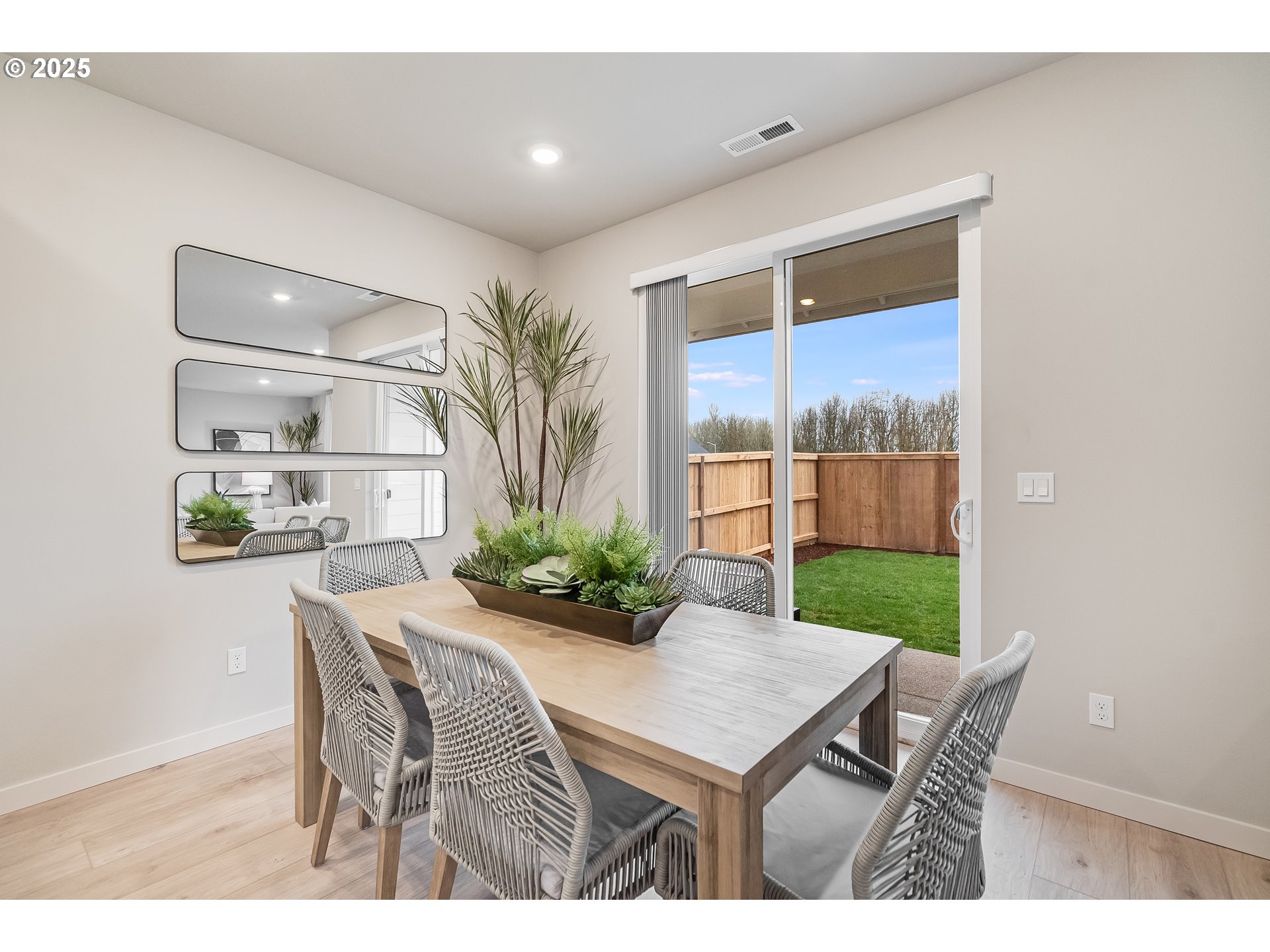 Undisclosed Address Albany, OR 97322 - Photo 5 of 42 a view of a dining room with furniture window and wooden floor