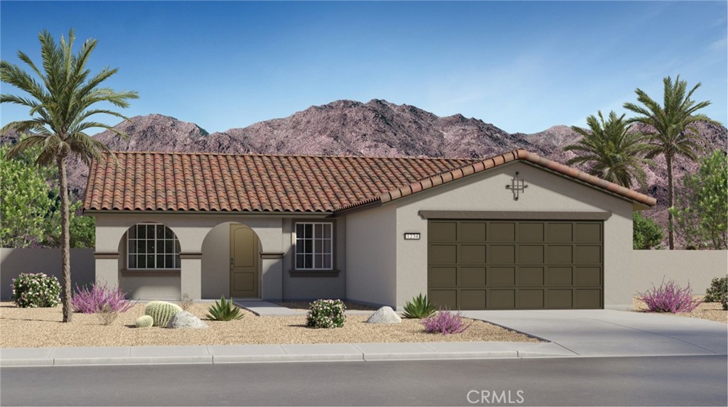 65424 Rancho Descanso Desert Hot Springs, CA 92240 - Photo 1 of 1 a front view of a house