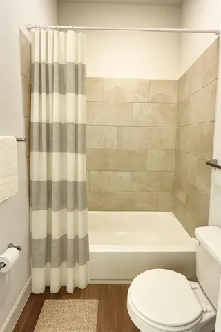 an empty room with a ceiling fan