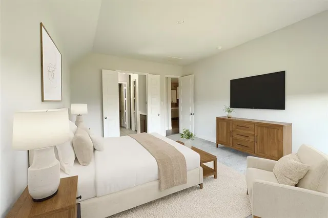 a bathroom with a bathtub and a sink