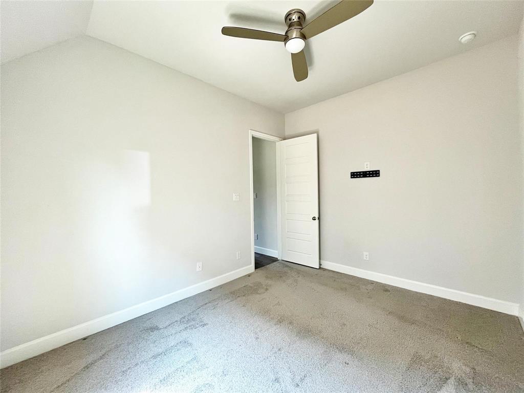 1505 Misty Pasture Way Mansfield, TX 76063 - Photo 29 of 31 an empty room with a ceiling fan