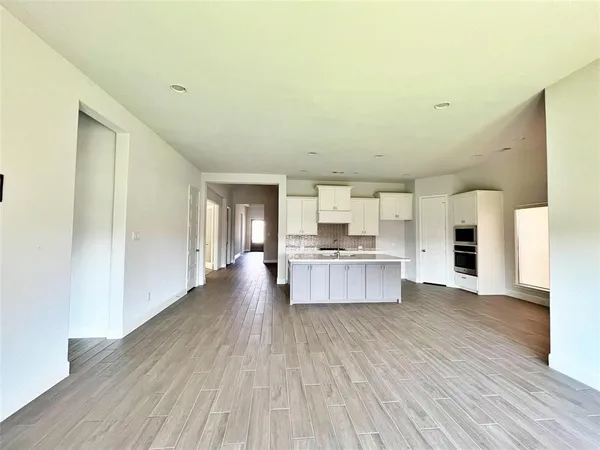 a bathroom with a bathtub and a toilet