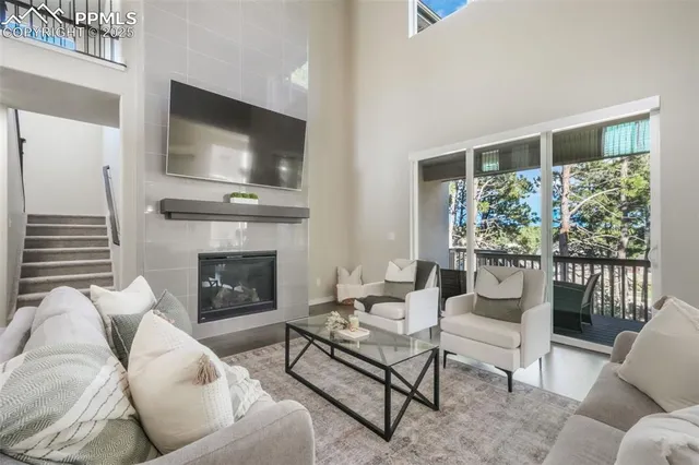 a living room with furniture and a window