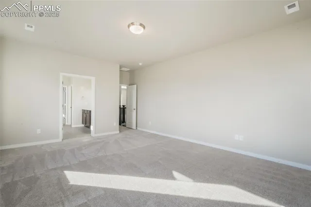 a bathroom with a granite countertop tub and a sink