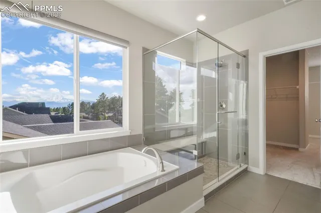 a view of a storage & utility room with washer and dryer