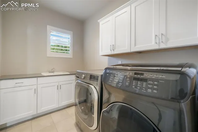 a view of a kitchen with a sink and a stove top oven