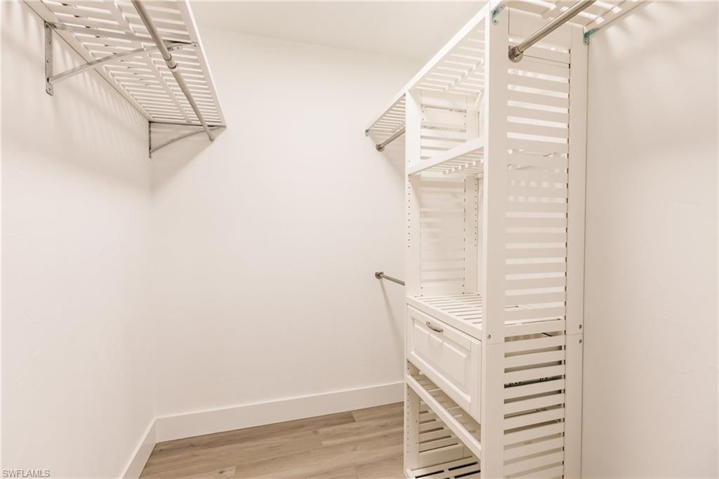 362 Pinehurst Circle Naples, FL 34113 - Photo 26 of 50 a view of a staircase with white walls