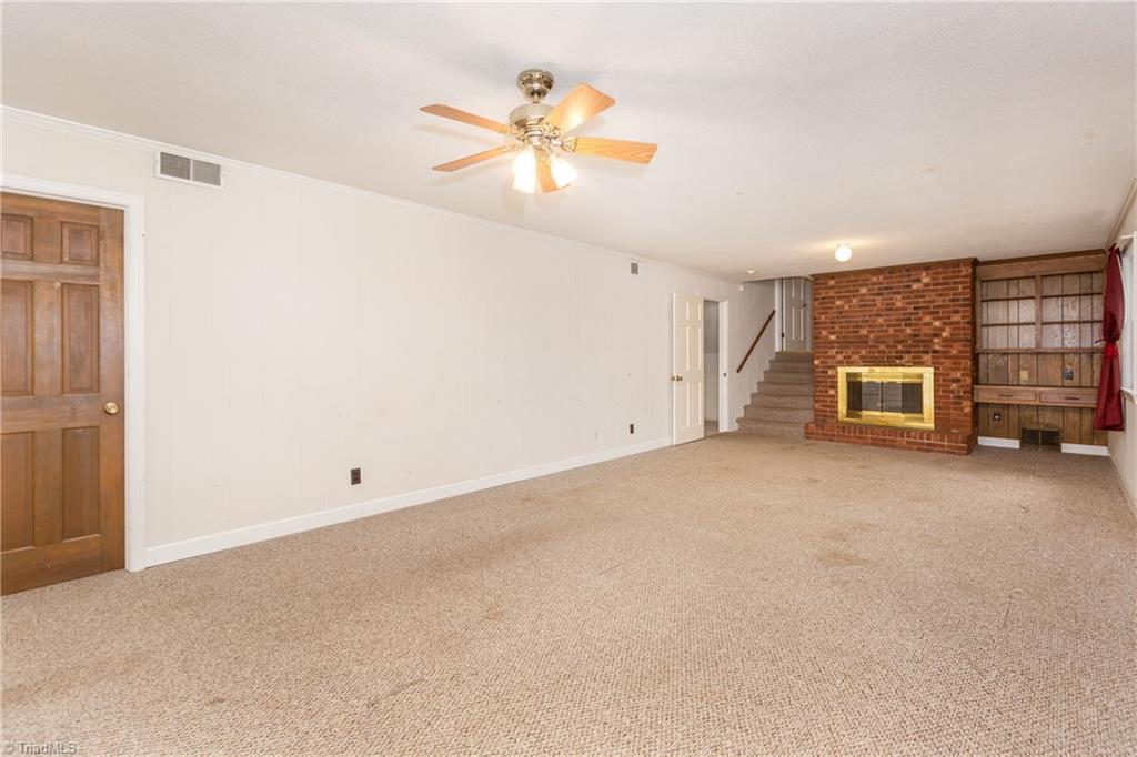 4250 Witherow Road Winston-Salem, NC 27106 - Photo 22 of 30 Another view of the den, bedroom 4 is to the left