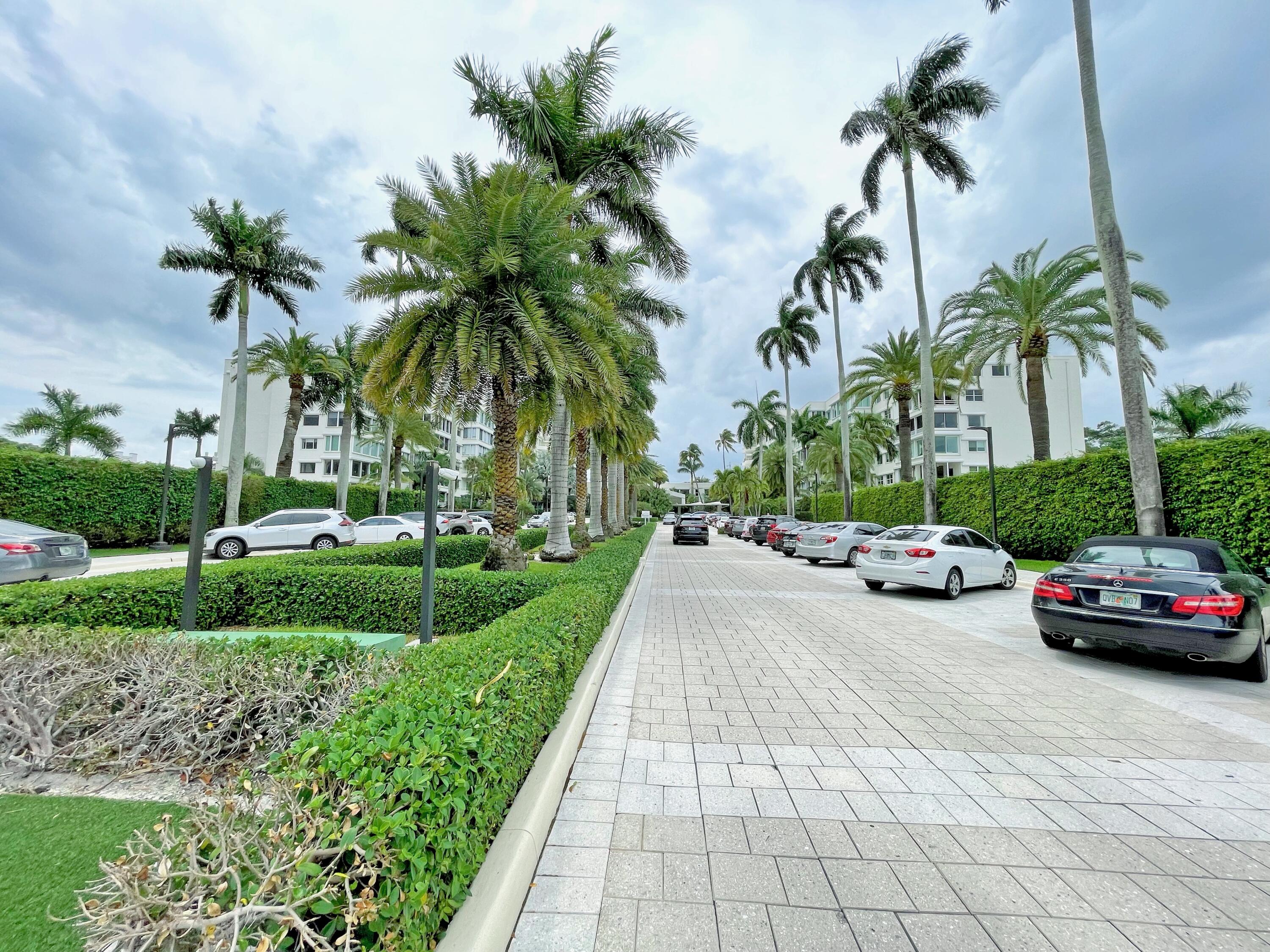 44 Cocoanut Row, Unit 308A Palm Beach, FL 33480 - Photo 2 of 4 a car parked on the side of a road