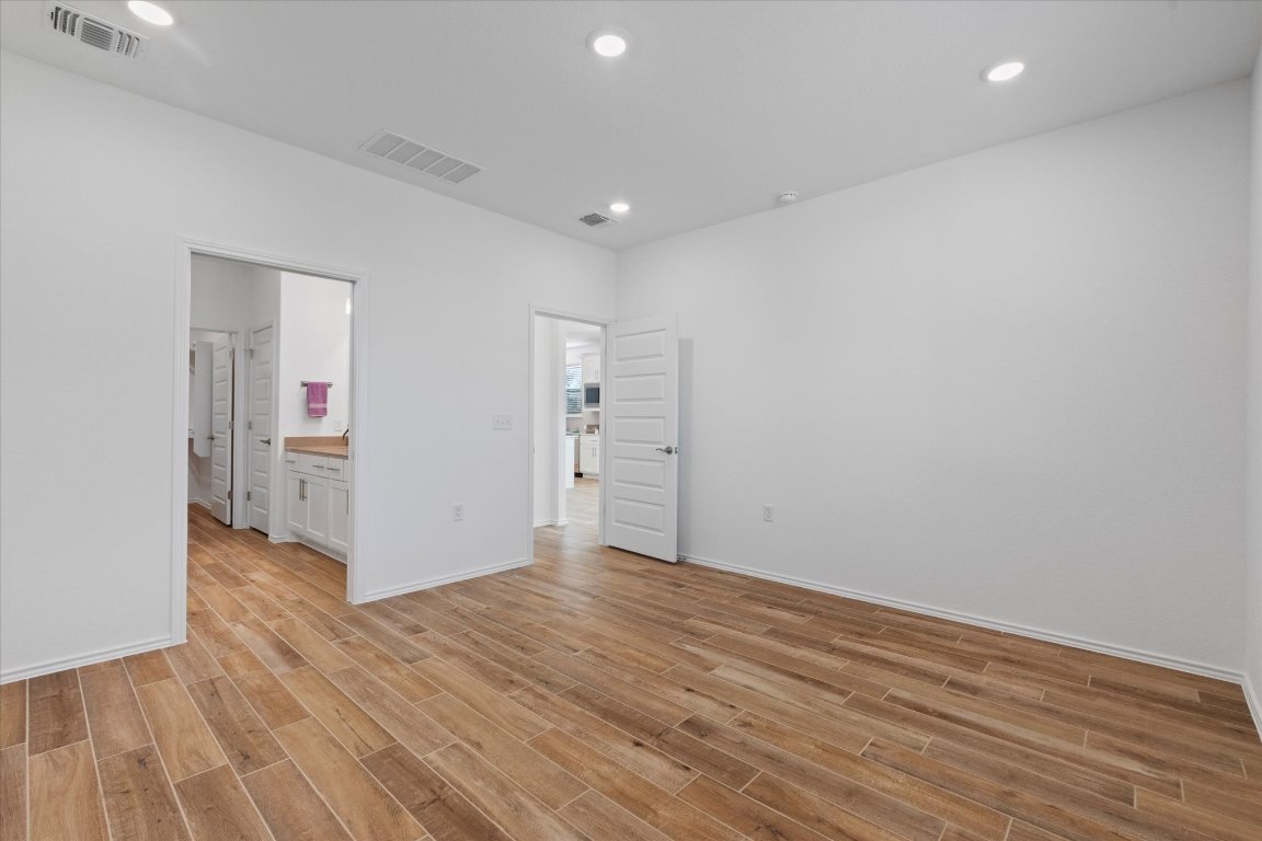 324 Livewater Lane Georgetown, TX 78633 - Photo 21 of 31 a view of a livingroom with wooden floor