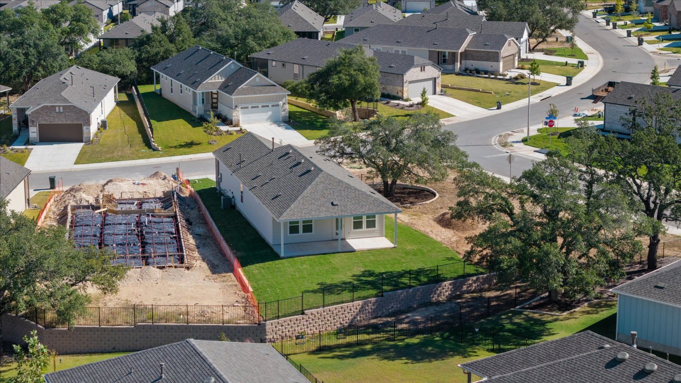 324 Livewater Lane Georgetown, TX 78633 - Photo 30 of 31 an aerial view of a house with a garden