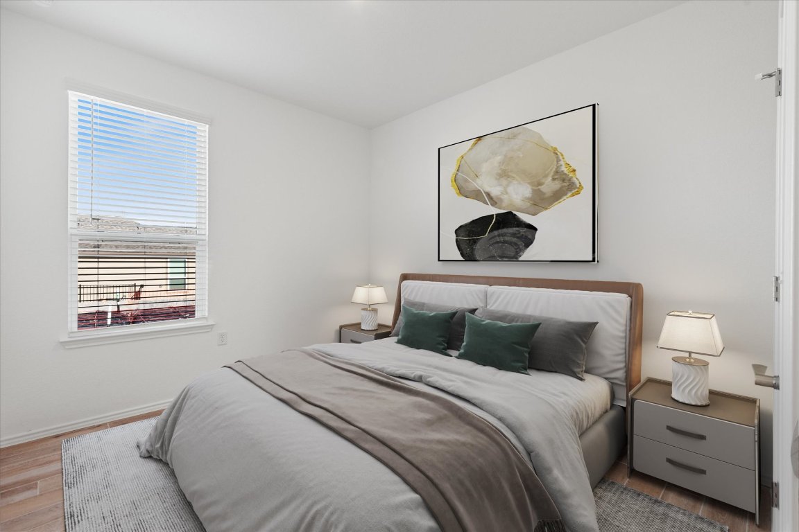 324 Livewater Lane Georgetown, TX 78633 - Photo 7 of 31 a bedroom with a bed and a painting on the wall