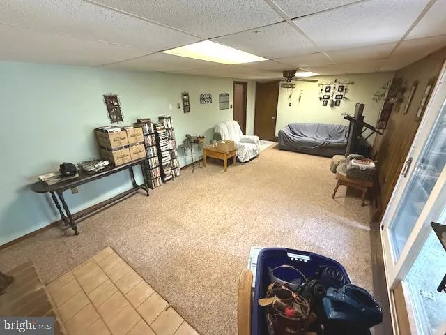 a bed room with a bed and a chair