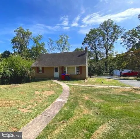 a view of a house with a swimming pool
