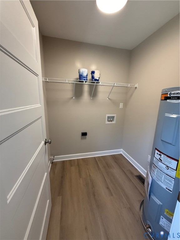 342 Barefords Mill Road Dunnsville, VA 22454 - Photo 11 of 15 a view of a room with wooden floor