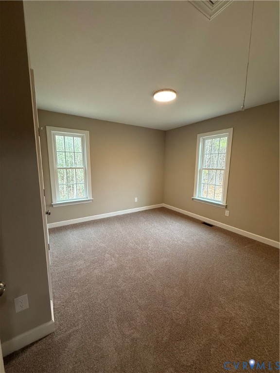 342 Barefords Mill Road Dunnsville, VA 22454 - Photo 13 of 15 an empty room with windows
