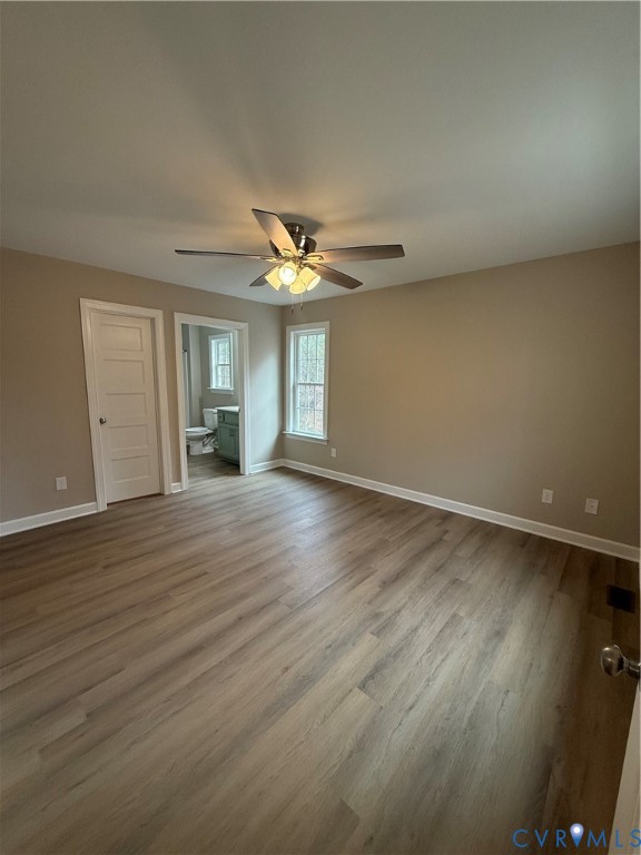 342 Barefords Mill Road Dunnsville, VA 22454 - Photo 5 of 15 a view of an empty room with a window