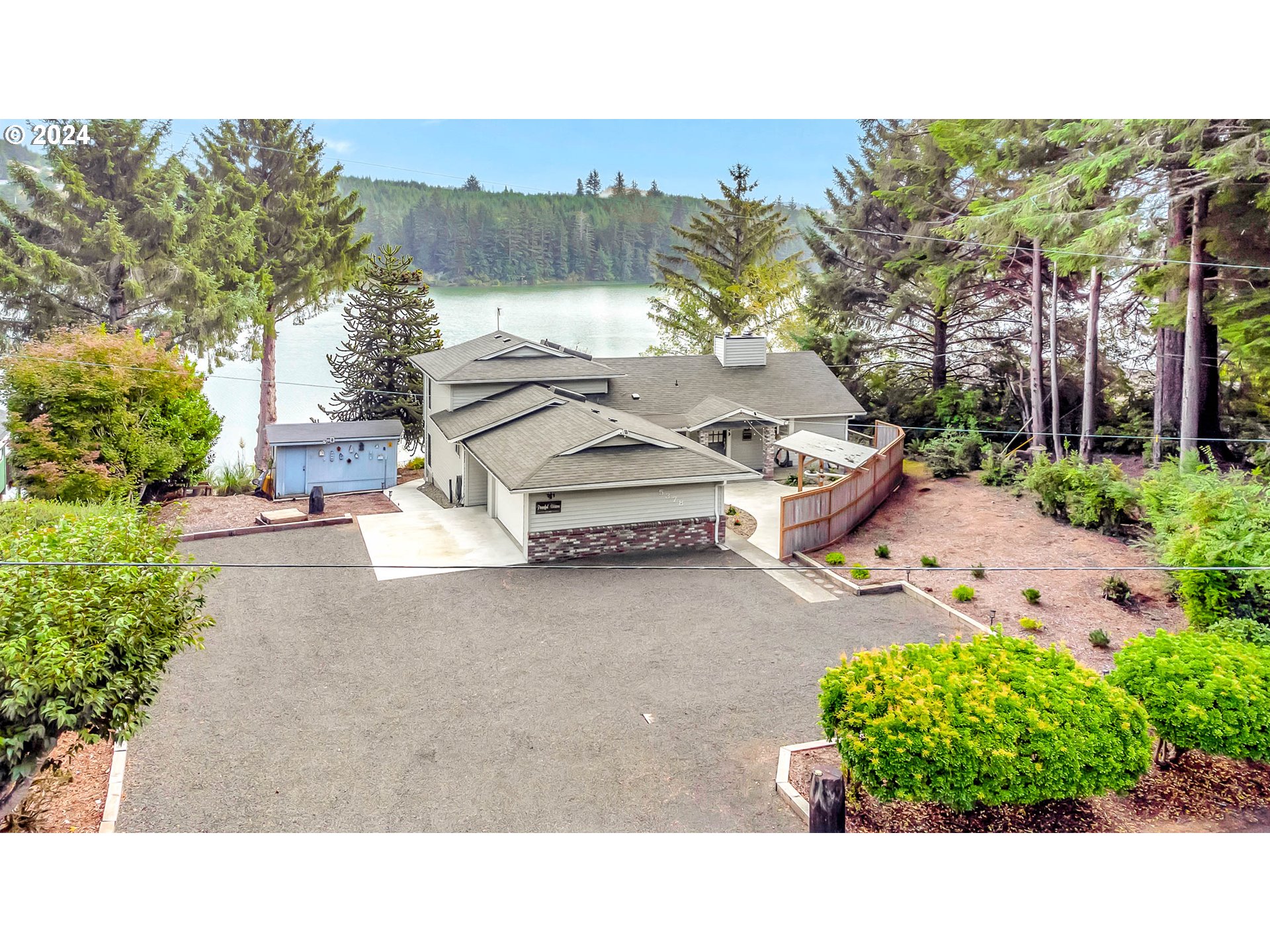 5378 Buckskin Bob Road Florence, OR 97439 - Photo 1 of 46 a picture of a park with large trees