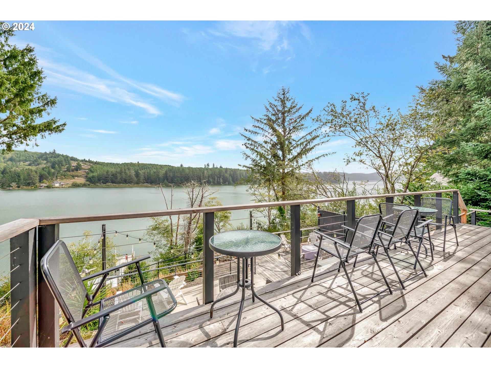 5378 Buckskin Bob Road Florence, OR 97439 - Photo 13 of 46 a view of swimming pool with outdoor seating and plants