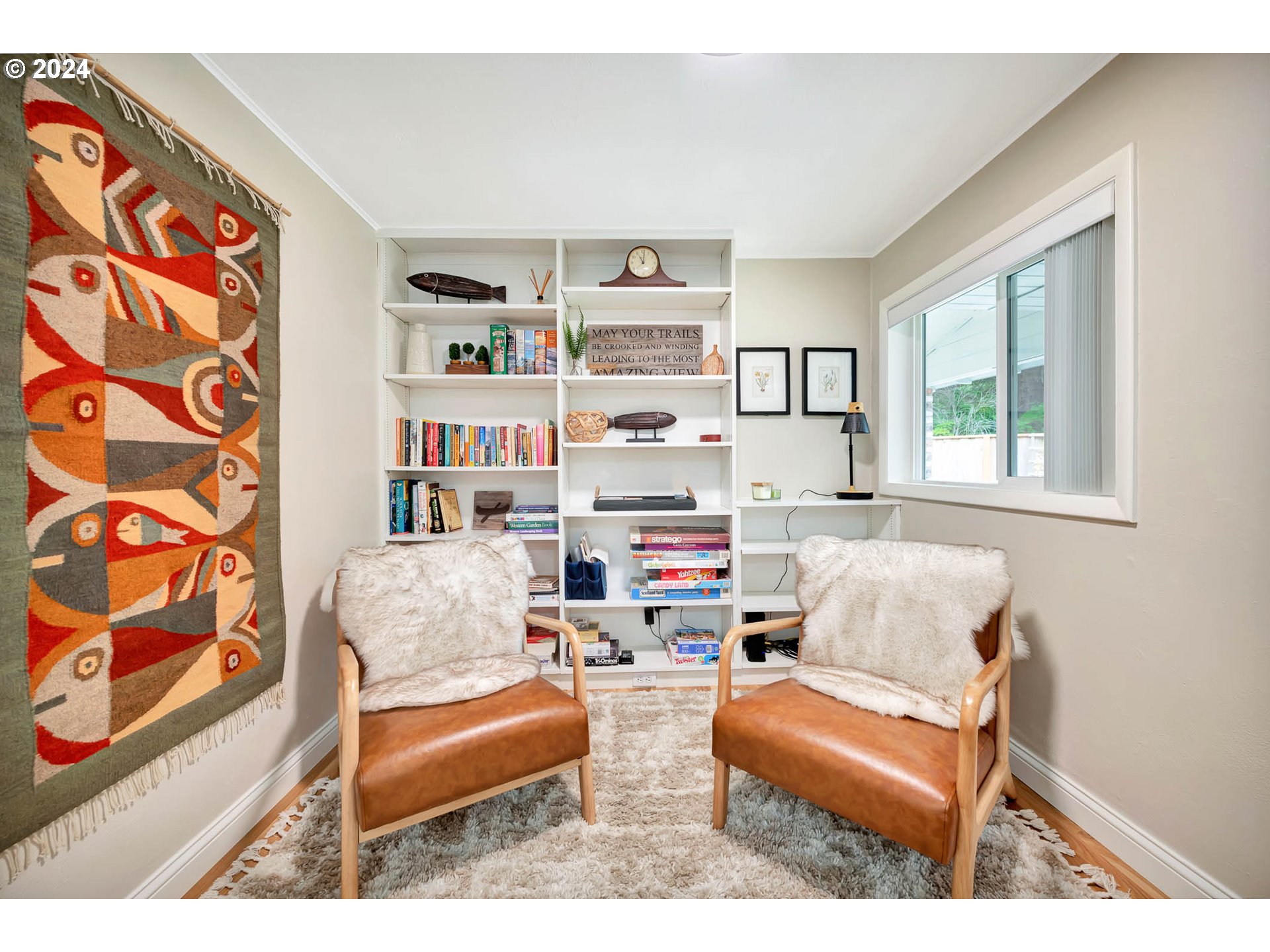 5378 Buckskin Bob Road Florence, OR 97439 - Photo 15 of 46 a living room with furniture and a window