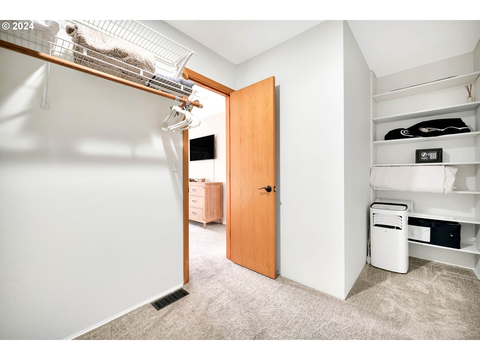 5378 Buckskin Bob Road Florence, OR 97439 - Photo 20 of 46 a view of a storage & utility room with washer and dryer